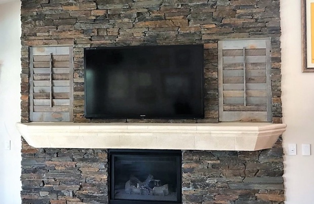 Shutters over a fireplace
